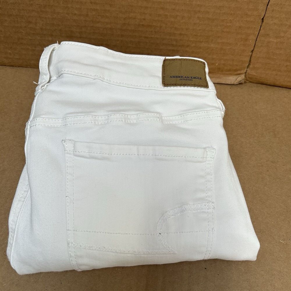 American Eagle Ne(x)t Level Stretch Hi-Rise Jegging‎ White Distressed Raw Hem 14